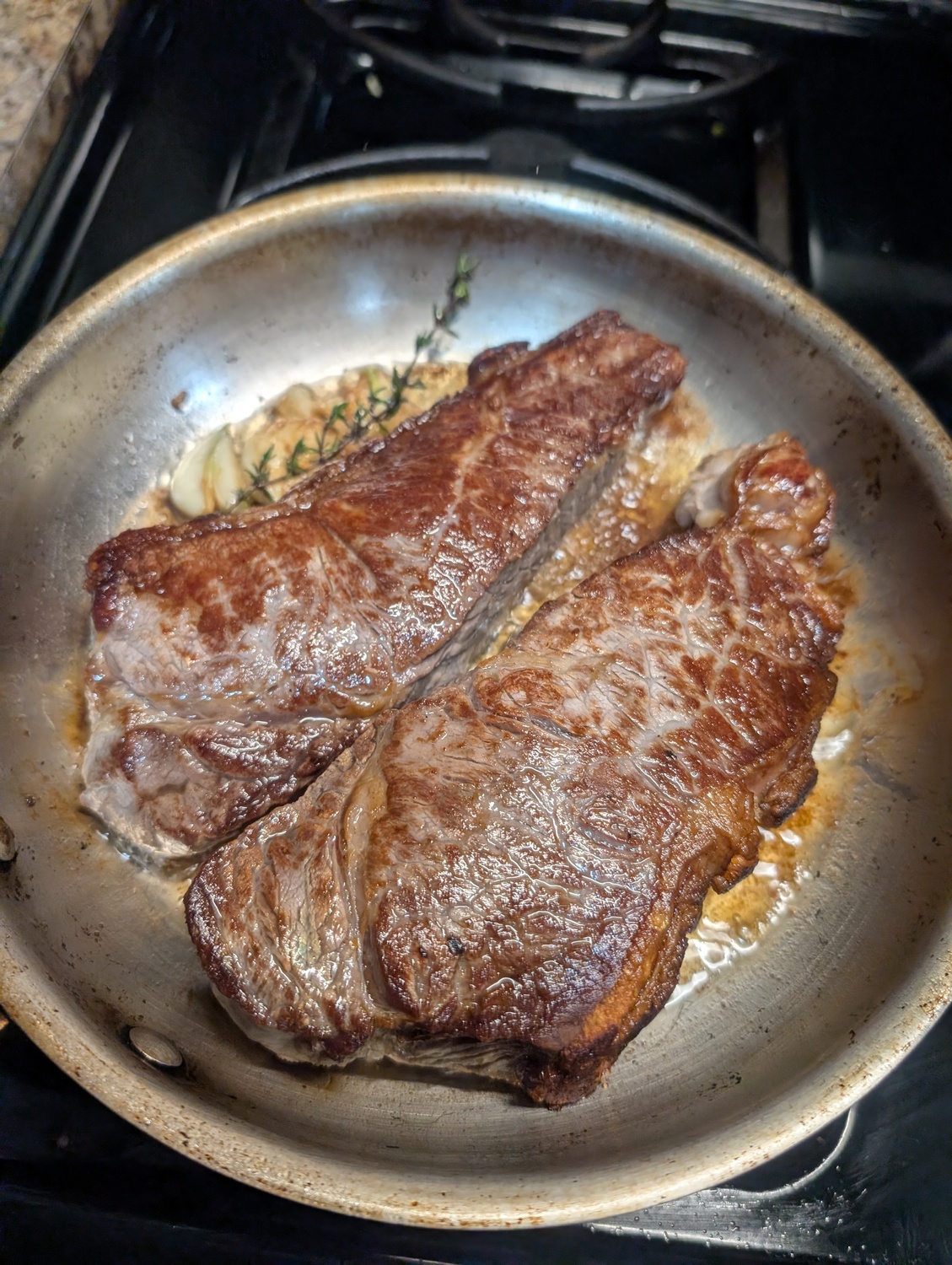 Steak, leftover shepherds pie, and roasted cabbage in garlic miso butter sauce
